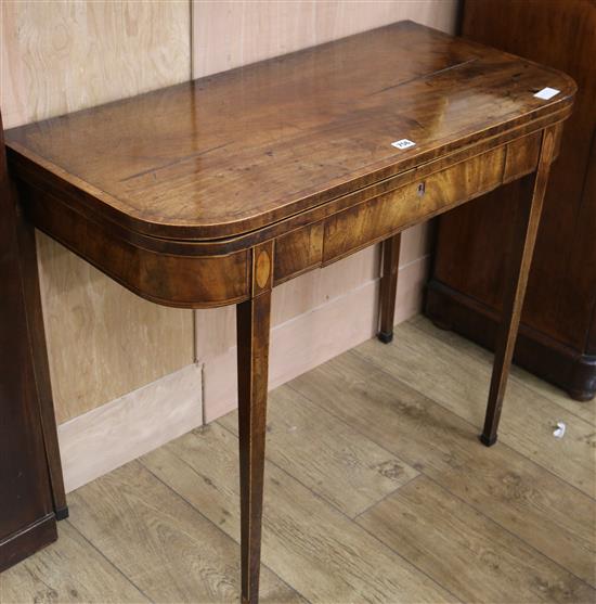 A George III mahogany card table W.91cm